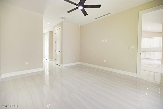 1328 SW 22nd Pl, Cape Coral, FL 33991 - empty room with a ceiling fan, light tile patterned floors, and recessed lighting