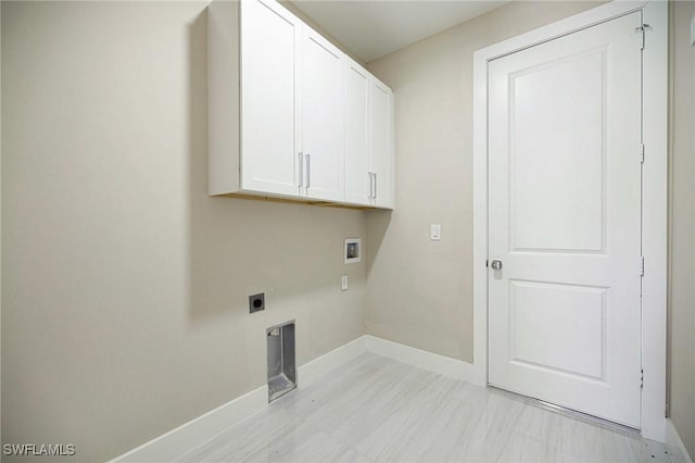 1328 SW 22nd Pl, Cape Coral, FL 33991 - laundry area featuring cabinet space, hookup for an electric dryer, and washer hookup