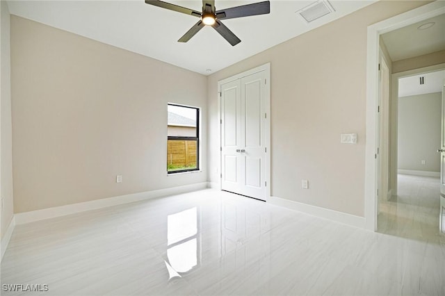 1328 SW 22nd Pl, Cape Coral, FL 33991 - unfurnished bedroom featuring a closet and ceiling fan