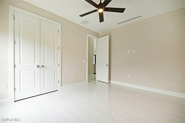 1328 SW 22nd Pl, Cape Coral, FL 33991 - unfurnished bedroom with a closet and a ceiling fan