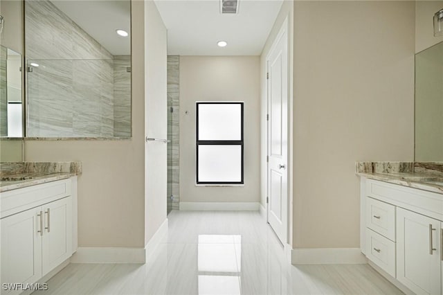 1328 SW 22nd Pl, Cape Coral, FL 33991 - bathroom with two vanities, tiled shower, and recessed lighting