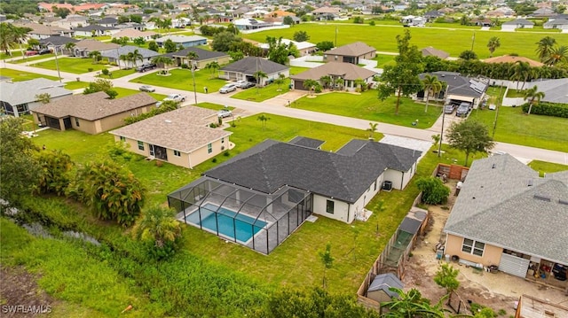1328 SW 22nd Pl, Cape Coral, FL 33991 - aerial perspective of suburban area with a pool