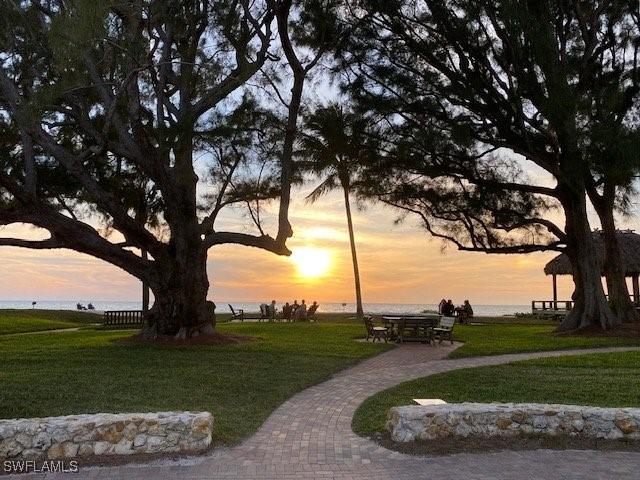 2500 Gulf Shore Blvd N Unit S9, Naples, FL 34103 - view of community with a lawn