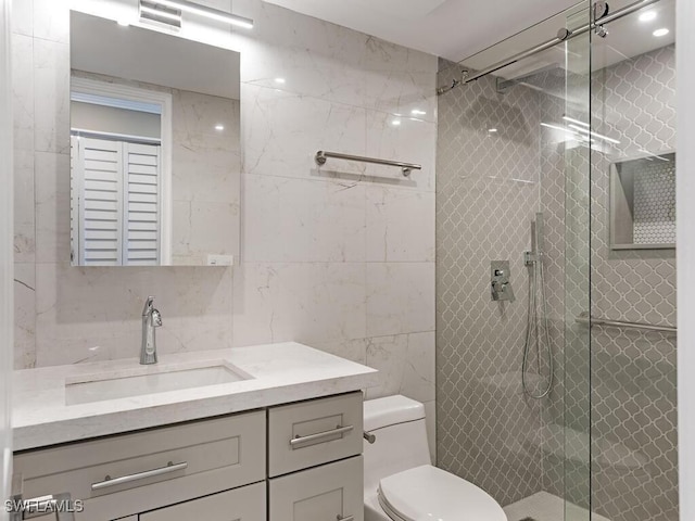 2500 Gulf Shore Blvd N Unit S9, Naples, FL 34103 - bathroom with vanity, tile walls, and a shower stall