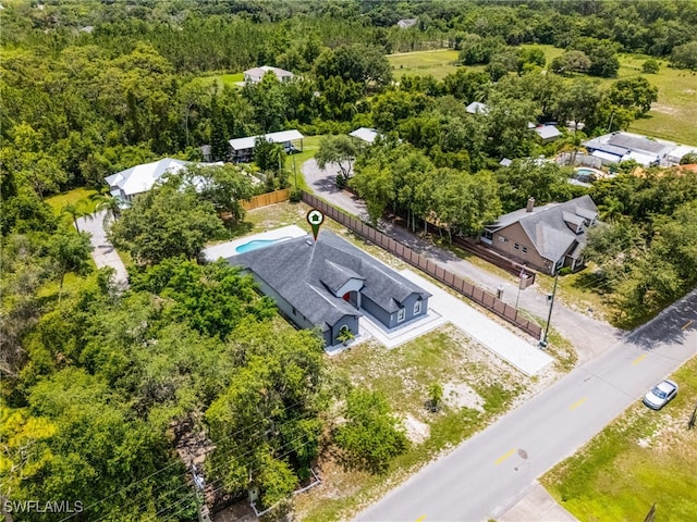4868 Chisholm Park Trl, Saint Cloud, FL 34771 - drone / aerial view of a heavily wooded area