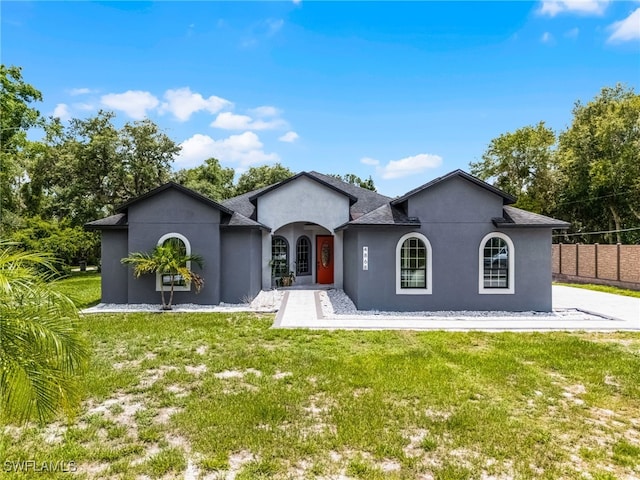 4868 Chisholm Park Trl, Saint Cloud, FL 34771 - rear view of property with stucco siding