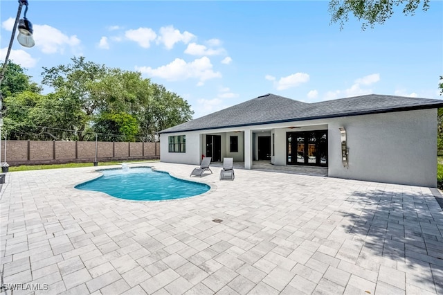 4868 Chisholm Park Trl, Saint Cloud, FL 34771 - view of swimming pool featuring a patio and french doors