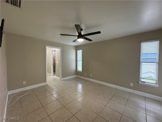4620 Parrot Ave, Naples, FL 34104 - unfurnished room featuring light tile patterned floors and a ceiling fan