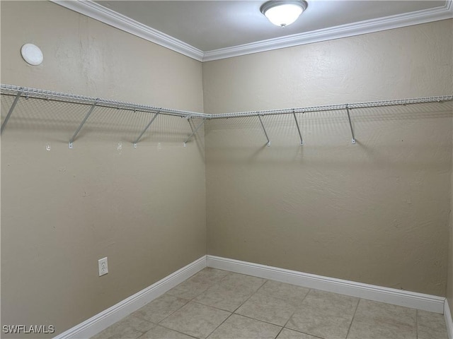4620 Parrot Ave, Naples, FL 34104 - walk in closet with light tile patterned floors