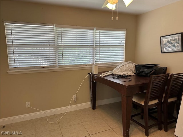 4620 Parrot Ave, Naples, FL 34104 - home office with light tile patterned flooring and ceiling fan