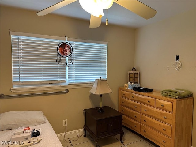 4620 Parrot Ave, Naples, FL 34104 - bedroom featuring light tile patterned floors and a ceiling fan