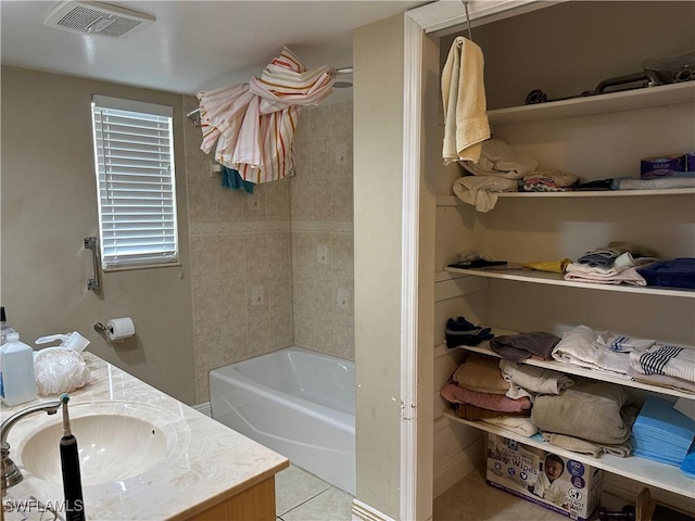 4620 Parrot Ave, Naples, FL 34104 - full bathroom featuring vanity, tile patterned floors, and tub / shower combination