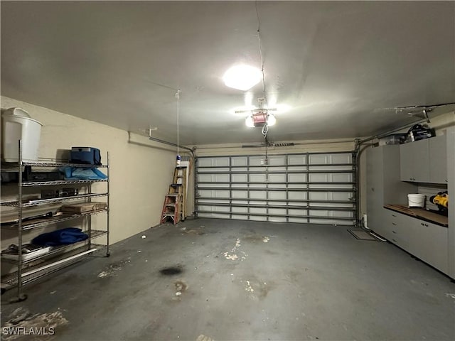 4620 Parrot Ave, Naples, FL 34104 - garage with a garage door opener