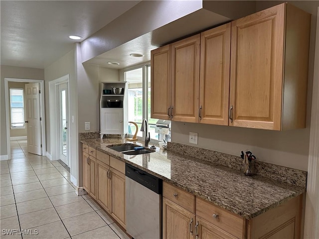 4620 Parrot Ave, Naples, FL 34104 - kitchen with dishwasher, light tile patterned floors, and stone counters