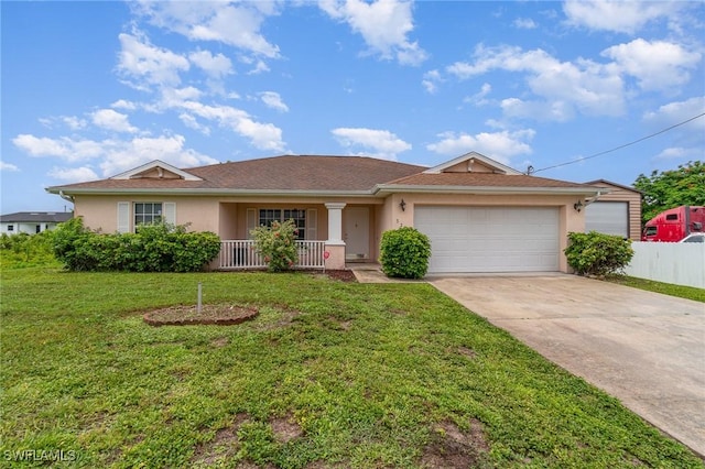 3213 22nd St SW, Lehigh Acres, FL 33976 - ranch-style house with stucco siding, covered porch, an attached garage, and driveway