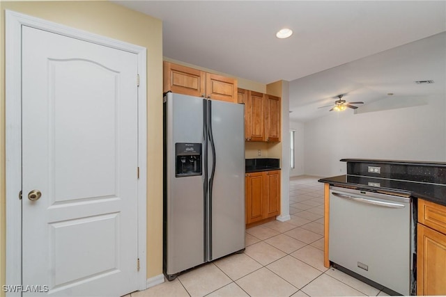 3213 22nd St SW, Lehigh Acres, FL 33976 - kitchen with stainless steel appliances, dark countertops, ceiling fan, light tile patterned floors, and recessed lighting
