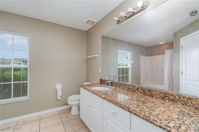 3213 22nd St SW, Lehigh Acres, FL 33976 - full bathroom with tile patterned floors, healthy amount of natural light, vanity, and a shower with shower curtain