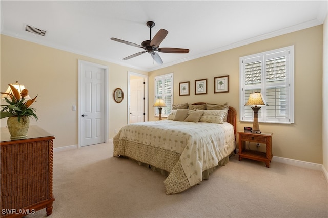 19332 La Serena Dr, Estero, FL 33967 - bedroom featuring crown molding, light colored carpet, and ceiling fan