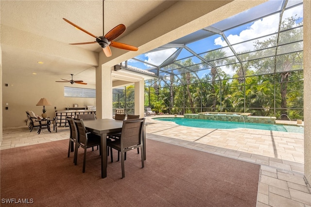 19332 La Serena Dr, Estero, FL 33967 - view of patio / terrace featuring ceiling fan, outdoor dining area, a pool with connected hot tub, and glass enclosure