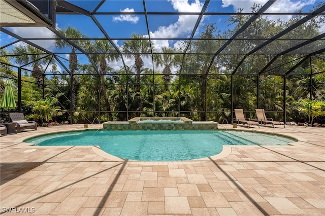 19332 La Serena Dr, Estero, FL 33967 - view of swimming pool featuring a patio area, a pool with connected hot tub, and a lanai
