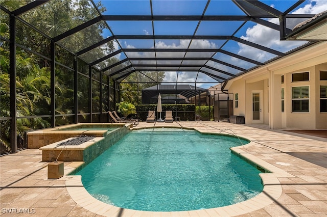 19332 La Serena Dr, Estero, FL 33967 - view of pool featuring a patio, a pool with connected hot tub, and glass enclosure