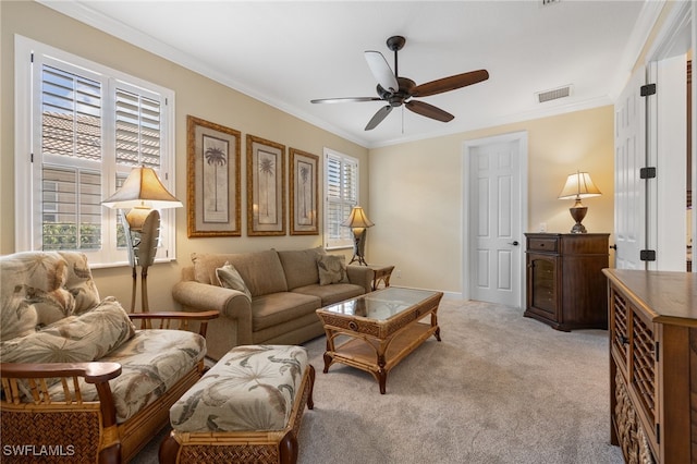19332 La Serena Dr, Estero, FL 33967 - living area with healthy amount of natural light, a ceiling fan, crown molding, and light carpet