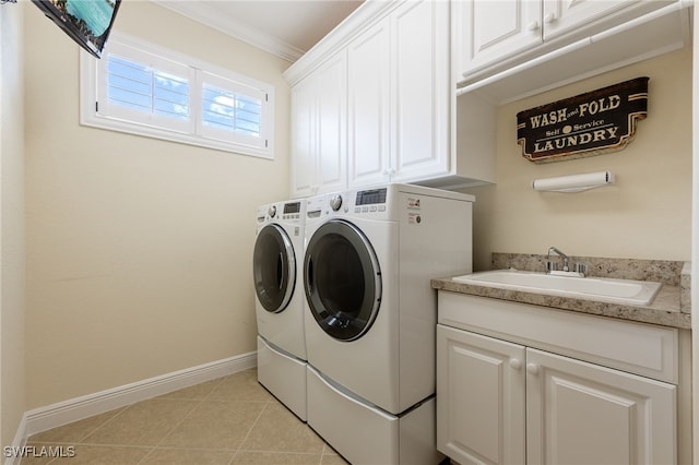 19332 La Serena Dr, Estero, FL 33967 - laundry room with separate washer and dryer, cabinet space, crown molding, and light tile patterned flooring