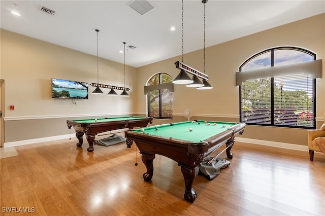 19332 La Serena Dr, Estero, FL 33967 - rec room with billiards table, wood finished floors, recessed lighting, and a towering ceiling
