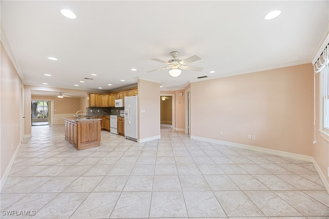 1120 Ridge St, Naples, FL 34103 - kitchen with white appliances, a ceiling fan, ornamental molding, open floor plan, and recessed lighting