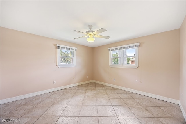 1120 Ridge St, Naples, FL 34103 - spare room featuring healthy amount of natural light and a ceiling fan
