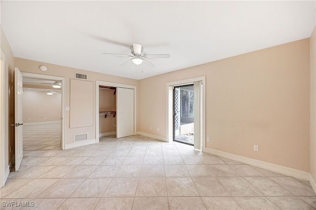 1120 Ridge St, Naples, FL 34103 - unfurnished bedroom with access to outside, a closet, and ceiling fan
