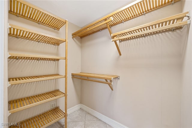1120 Ridge St, Naples, FL 34103 - spacious closet with tile patterned floors