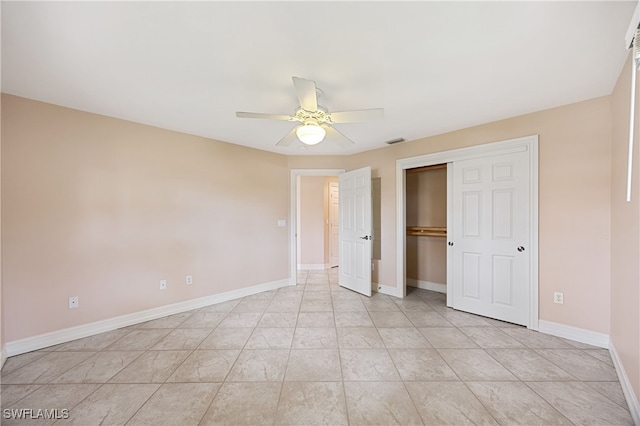 1120 Ridge St, Naples, FL 34103 - unfurnished bedroom featuring a ceiling fan, a closet, and light tile patterned flooring