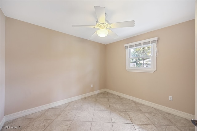 1120 Ridge St, Naples, FL 34103 - empty room featuring baseboards and a ceiling fan