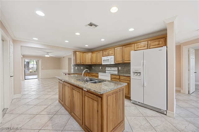1120 Ridge St, Naples, FL 34103 - kitchen with white appliances, ornamental molding, backsplash, light stone countertops, and recessed lighting
