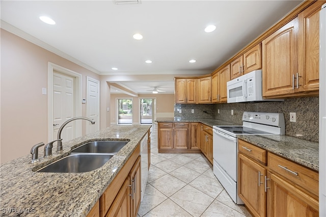 1120 Ridge St, Naples, FL 34103 - kitchen with white appliances, crown molding, stone counters, decorative backsplash, and light tile patterned floors