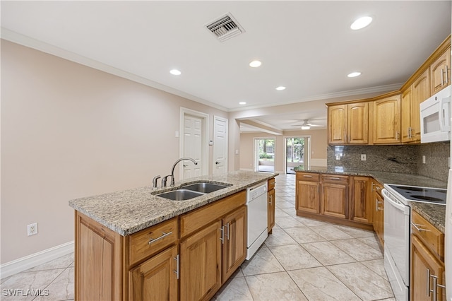 1120 Ridge St, Naples, FL 34103 - kitchen featuring white appliances, ornamental molding, tasteful backsplash, stone countertops, and recessed lighting