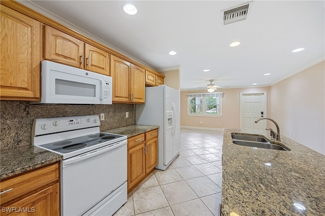 1120 Ridge St, Naples, FL 34103 - kitchen featuring white appliances, crown molding, backsplash, a ceiling fan, and dark stone countertops