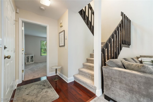 13660 Abbey Dr Unit 1, Fort Myers, FL 33919 - staircase with wood finished floors and baseboards