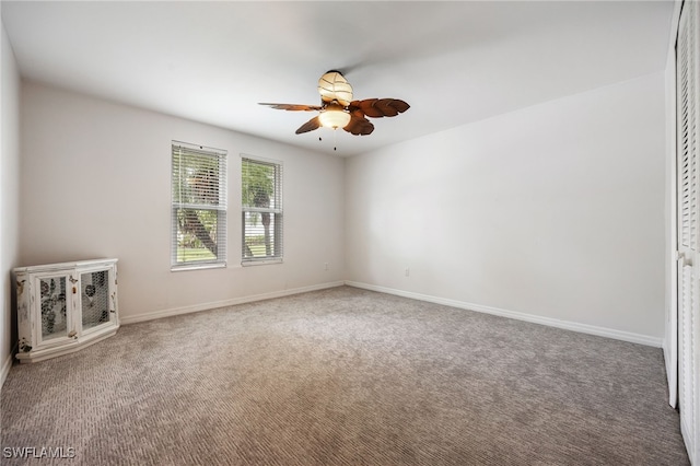 13660 Abbey Dr Unit 1, Fort Myers, FL 33919 - spare room with a ceiling fan and carpet