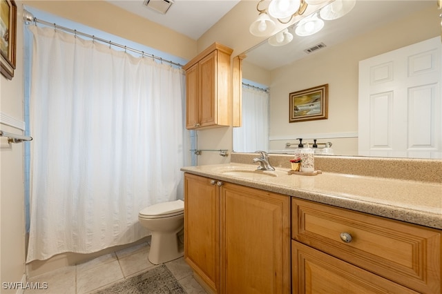 13660 Abbey Dr Unit 1, Fort Myers, FL 33919 - full bathroom with vanity, tile patterned flooring, and a chandelier