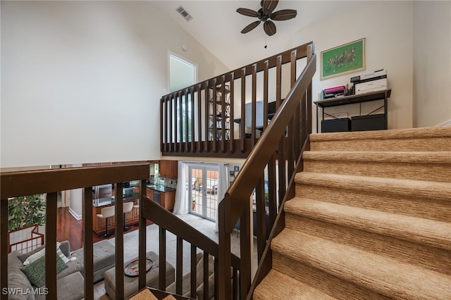 13660 Abbey Dr Unit 1, Fort Myers, FL 33919 - stairway with ceiling fan and carpet floors