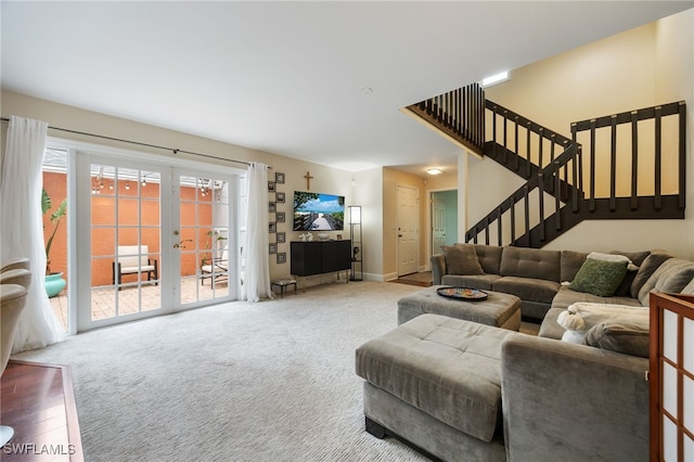 13660 Abbey Dr Unit 1, Fort Myers, FL 33919 - living area featuring stairway, carpet floors, and french doors