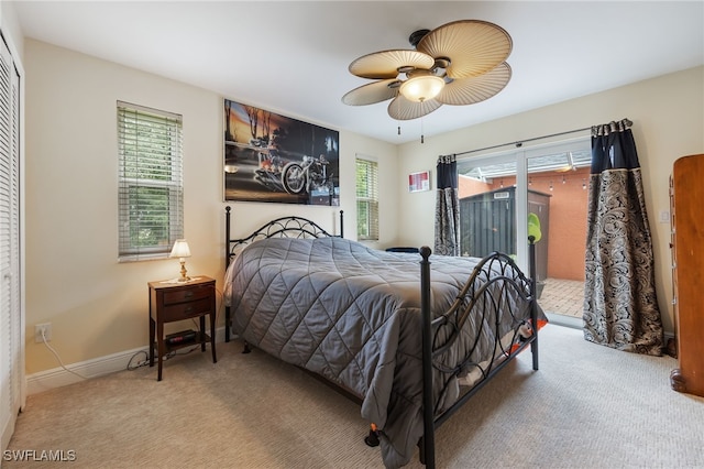 13660 Abbey Dr Unit 1, Fort Myers, FL 33919 - carpeted bedroom with access to outside and a ceiling fan