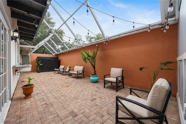13660 Abbey Dr Unit 1, Fort Myers, FL 33919 - view of patio / terrace featuring glass enclosure