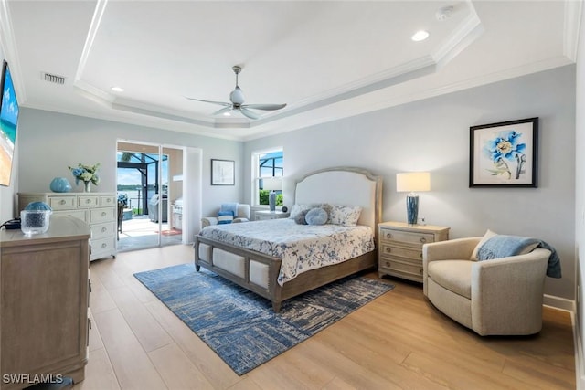 9380 Slate Ct, Naples, FL 34120 - bedroom with a tray ceiling, crown molding, light wood-type flooring, access to outside, and a ceiling fan