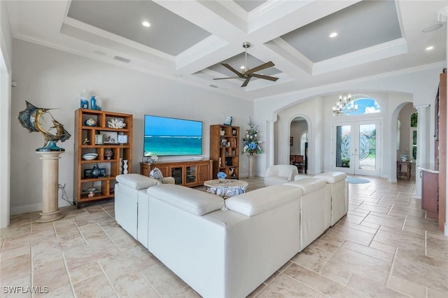 9380 Slate Ct, Naples, FL 34120 - living room with arched walkways, french doors, coffered ceiling, beam ceiling, and stone tile flooring
