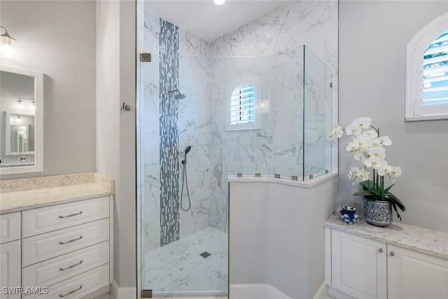 9380 Slate Ct, Naples, FL 34120 - full bath featuring plenty of natural light, vanity, and a marble finish shower