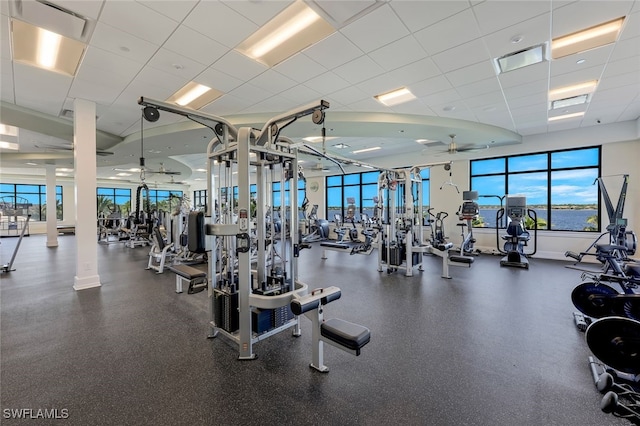 9380 Slate Ct, Naples, FL 34120 - gym with ceiling fan and a paneled ceiling