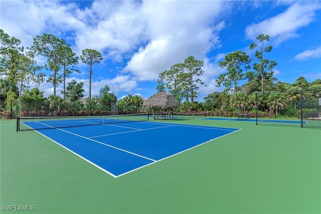 2050 Terrazzo Ln, Naples, FL 34104 - view of tennis court with community basketball court